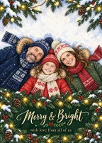 An illustrated family of three lying together in snow beneath evergreen branches, with the cover words “Merry & Bright” and “with love from all of us.”