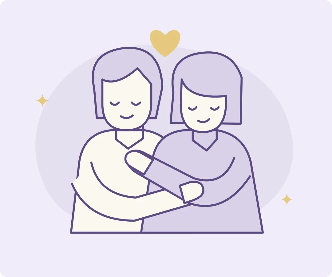 Two people sharing a comfortable hug, with a small gold heart above them.