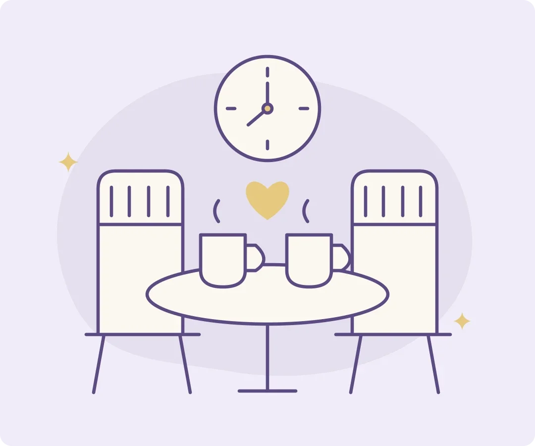 Two mugs on a small table between two chairs, with a clock and a heart above them.